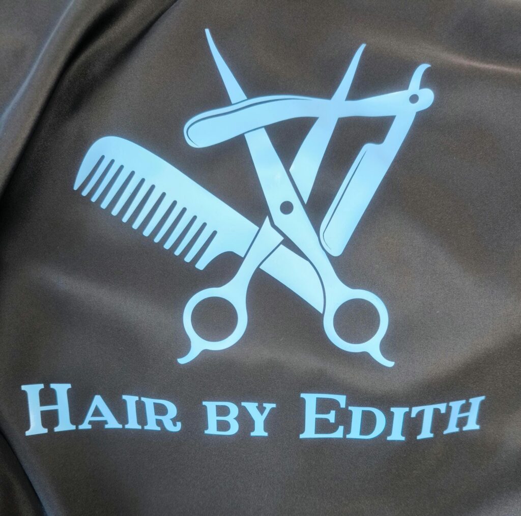 Hair Salon & Barber Cape with Pre-Designed Logo. Customizable Text for a Unique, Branded Look for Professional Stylists and Barbers.